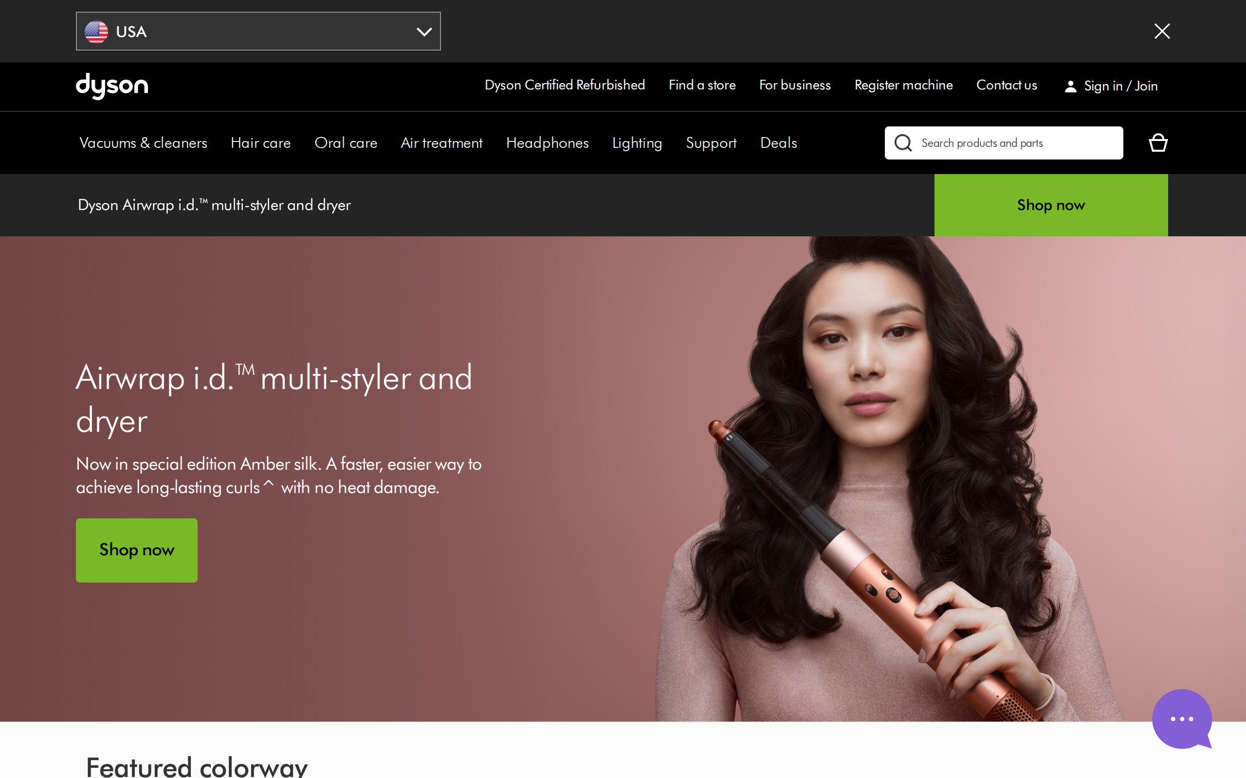 The Dyson Airwrap i.d. page with a model curling her hair